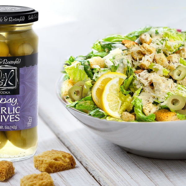 Caesar salad with Vodka Garlic Tipsy Olives